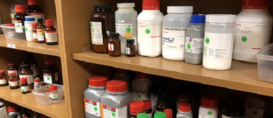 chemical bottles on a shelf